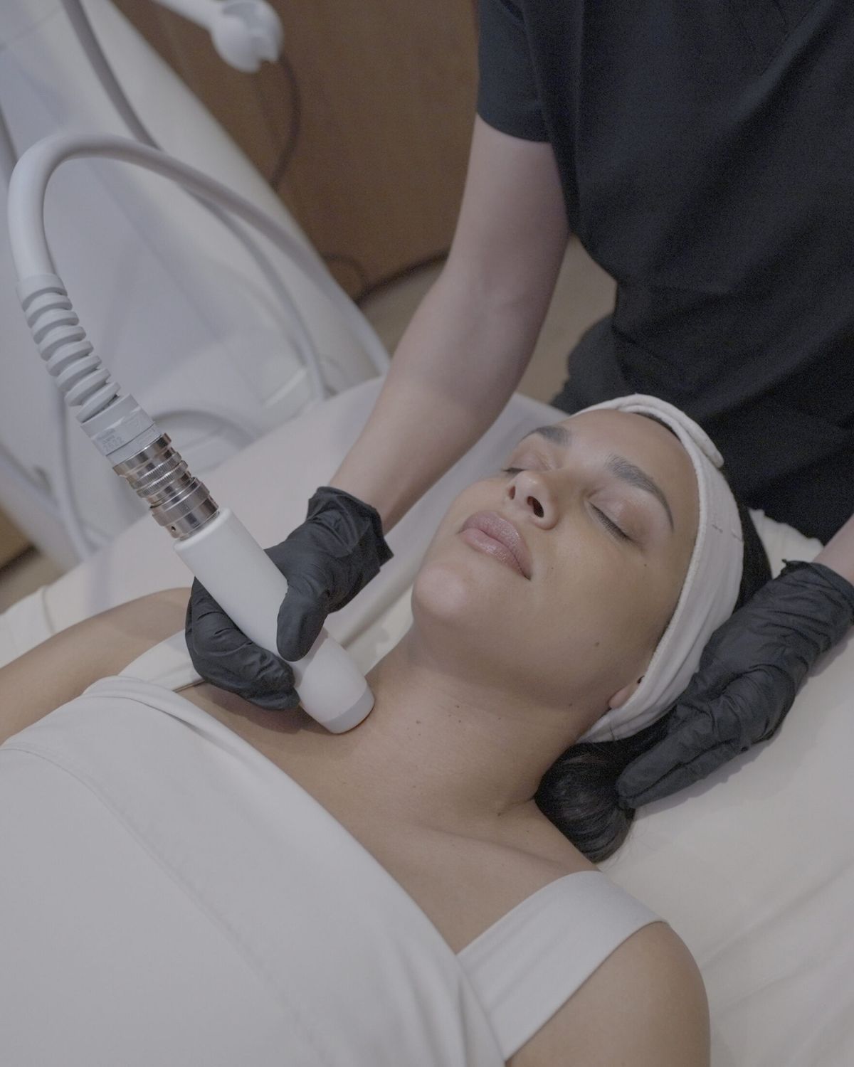 Facial treatment in a skincare clinic setting.