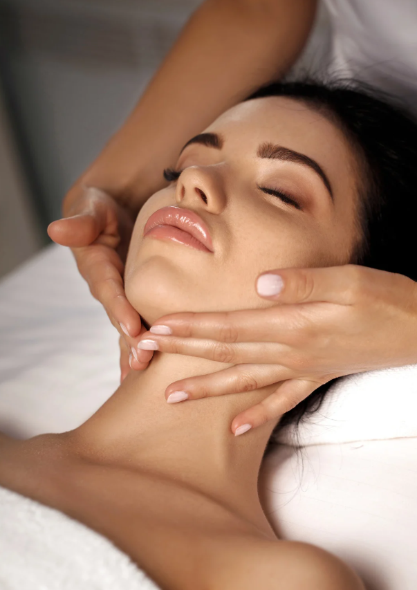 Friends enjoying champagne in cozy robes.